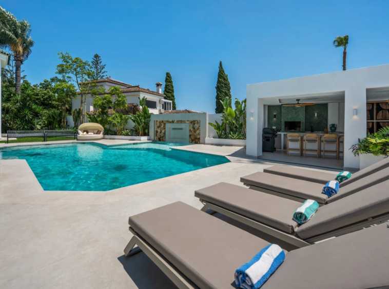 Poolside loungers and garden pavilion in Bel Air, Estepona
