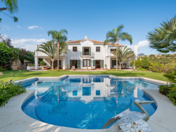 Mediterranean villa and private pool surrounded by mature gardens in Benahavis
