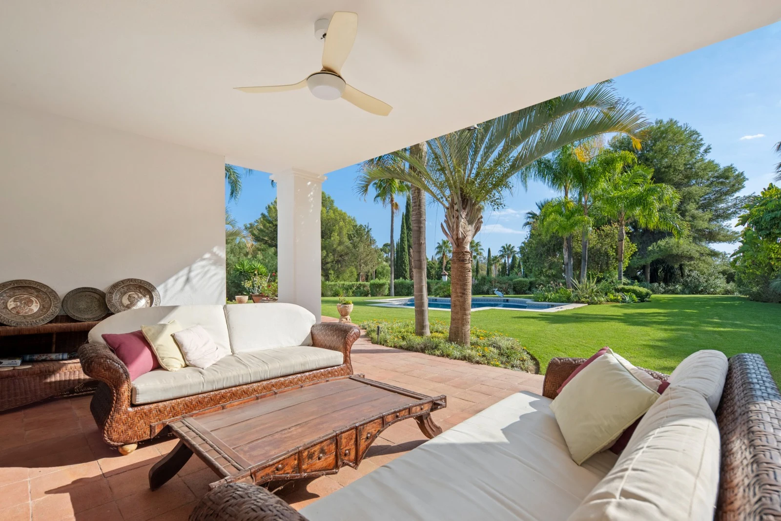 Shaded covered terrace overlooking the mature garden
