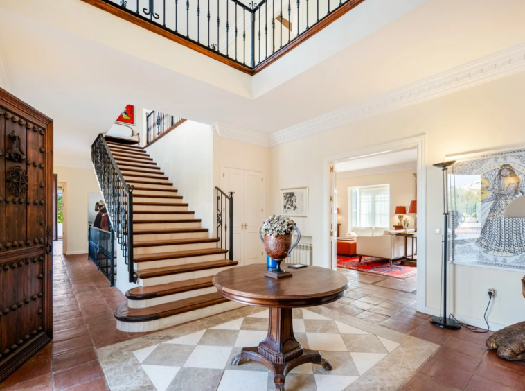 Entrance hall and staircase with traditional detailing
