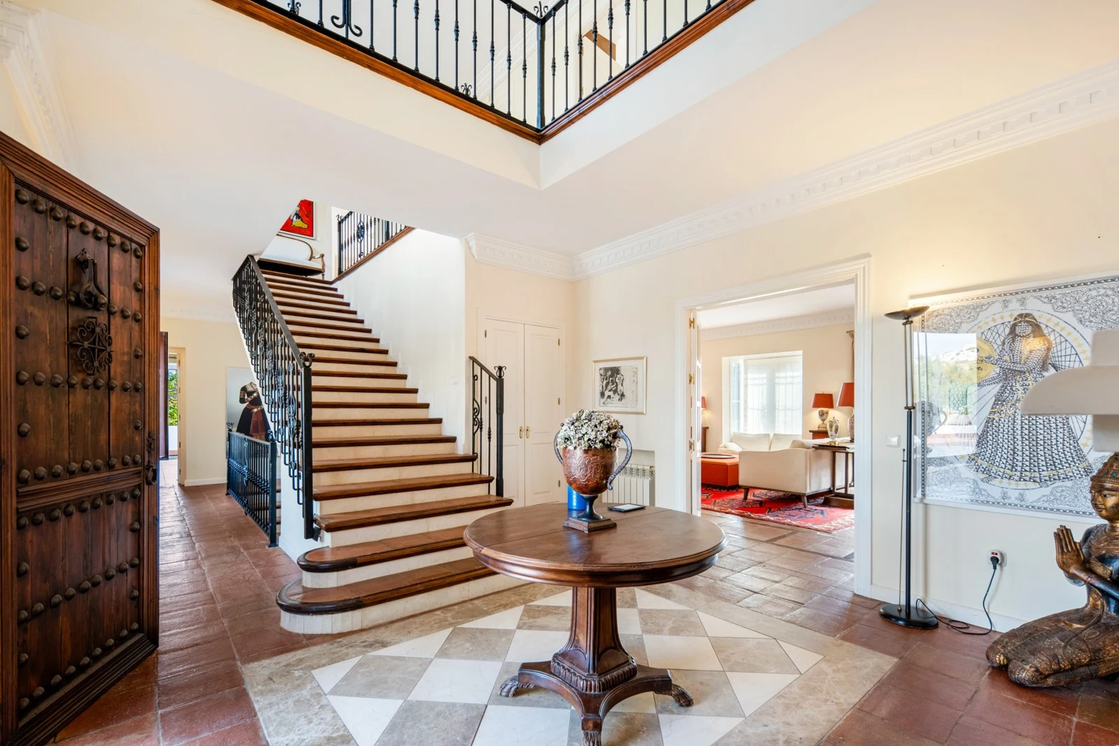 Entrance hall and staircase with traditional detailing