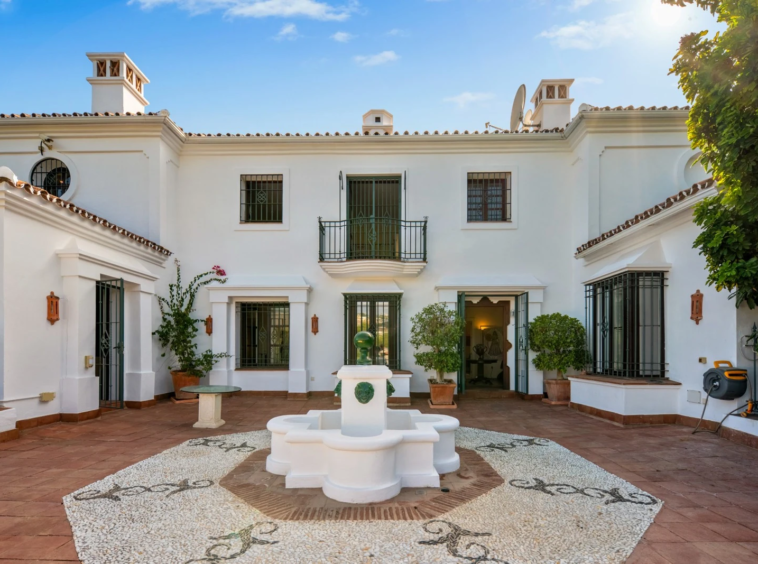 Courtyard entrance with a central fountain