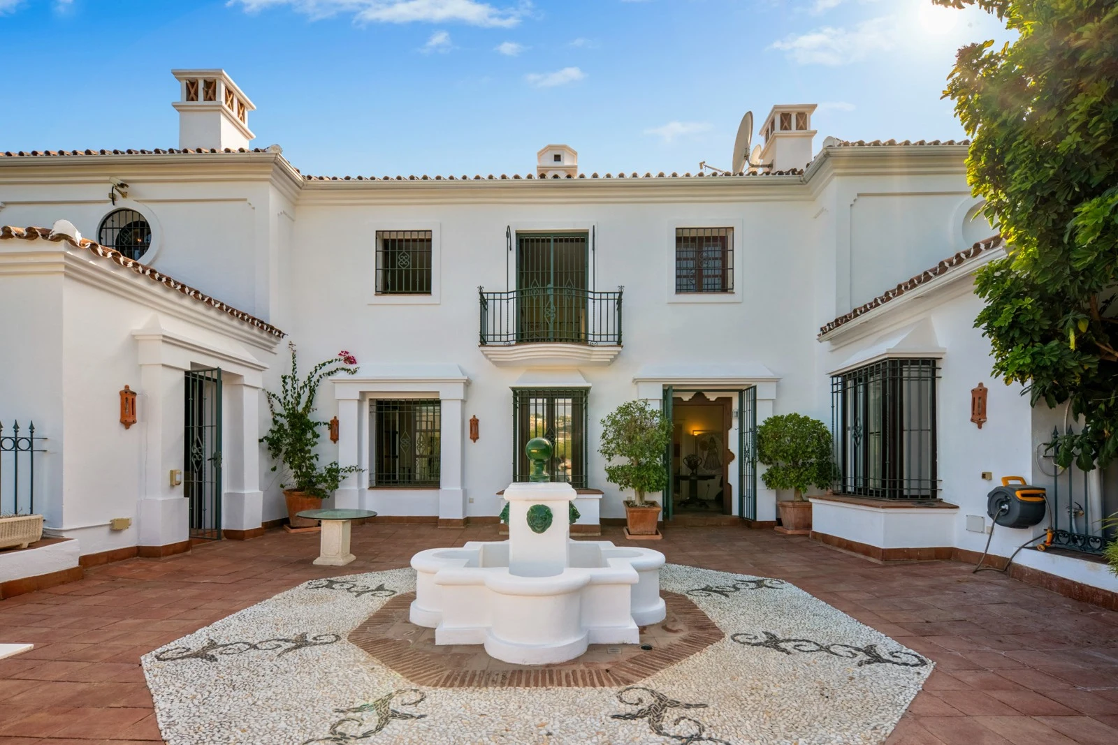 Courtyard entrance with a central fountain
