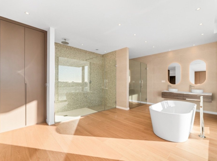 Bathroom with freestanding bath and shower