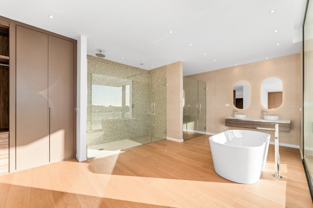 Bathroom with freestanding bath and shower
