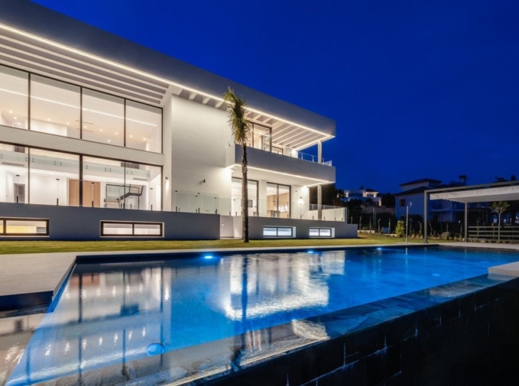 Evening view of the villa and private pool