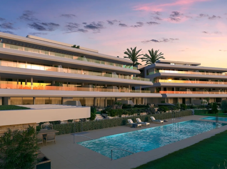 Illustrative apartments and communal pool at dusk in Buenas Noches