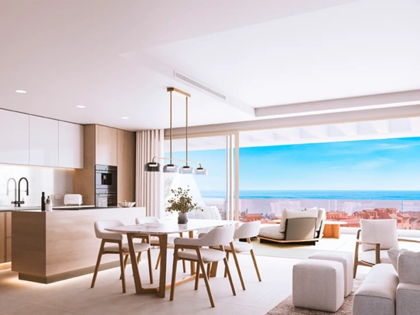 Illustrative open kitchen and dining area with sea views in Estepona