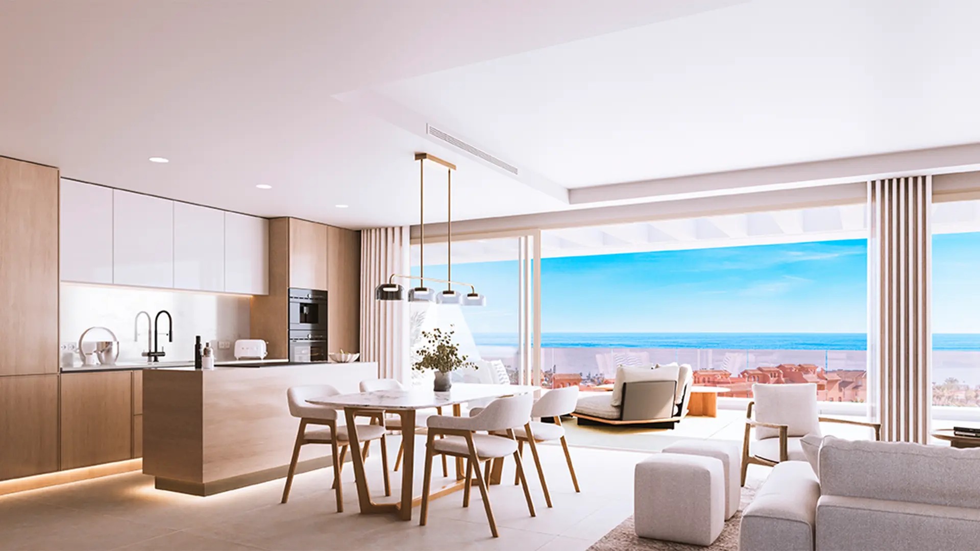 Illustrative open kitchen and dining area with sea views in Estepona