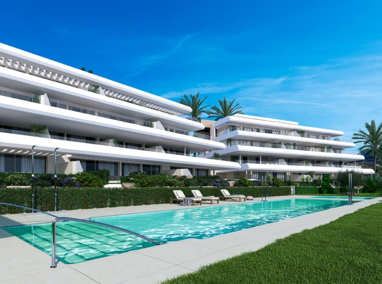 Illustrative communal swimming pool and landscaped grounds in Estepona