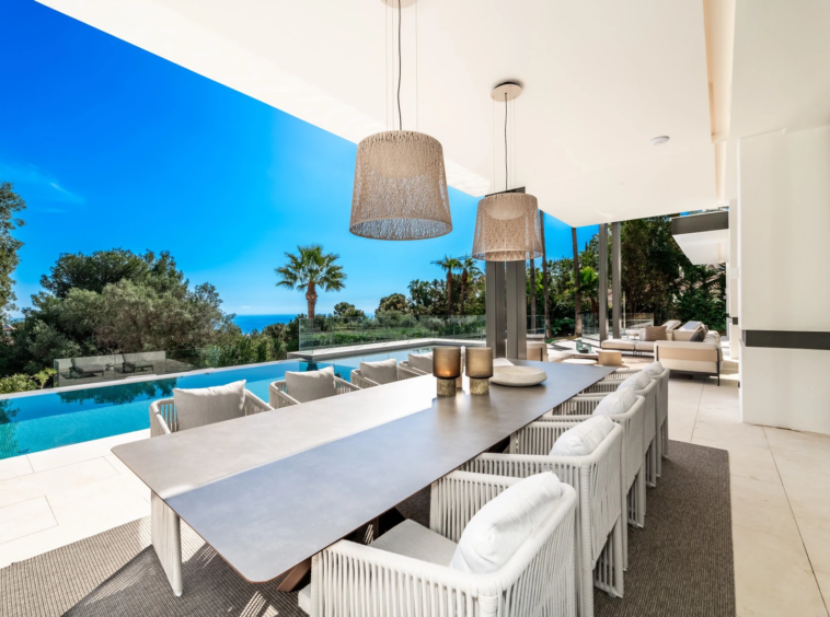 Outdoor dining terrace beside the private swimming pool