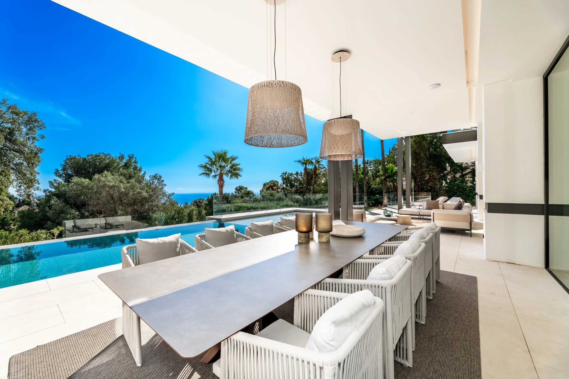 Outdoor dining terrace beside the private swimming pool