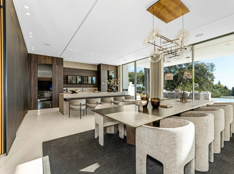 Dining room with garden views and a long dining table