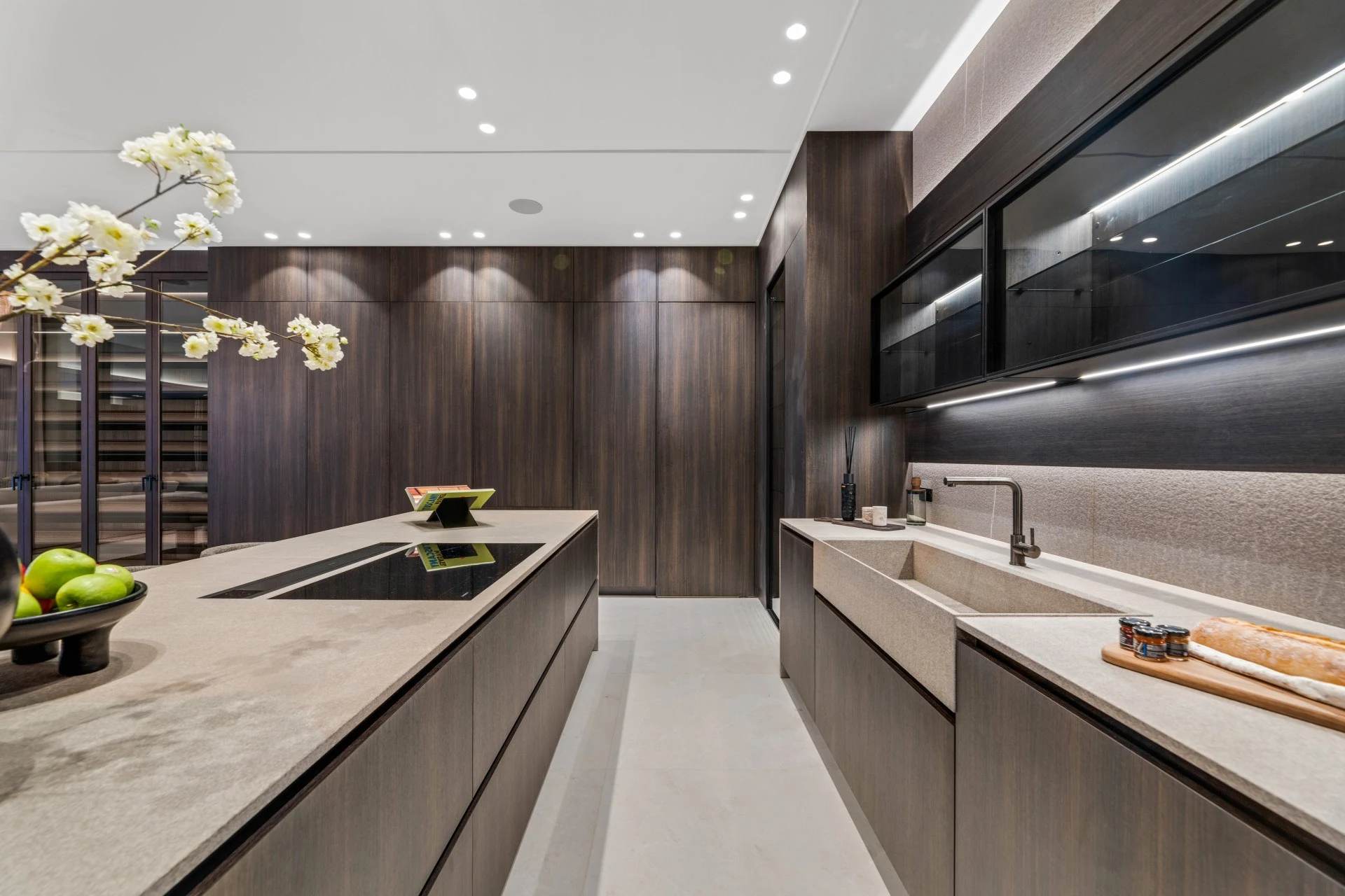 Separate service kitchen with fitted cabinets