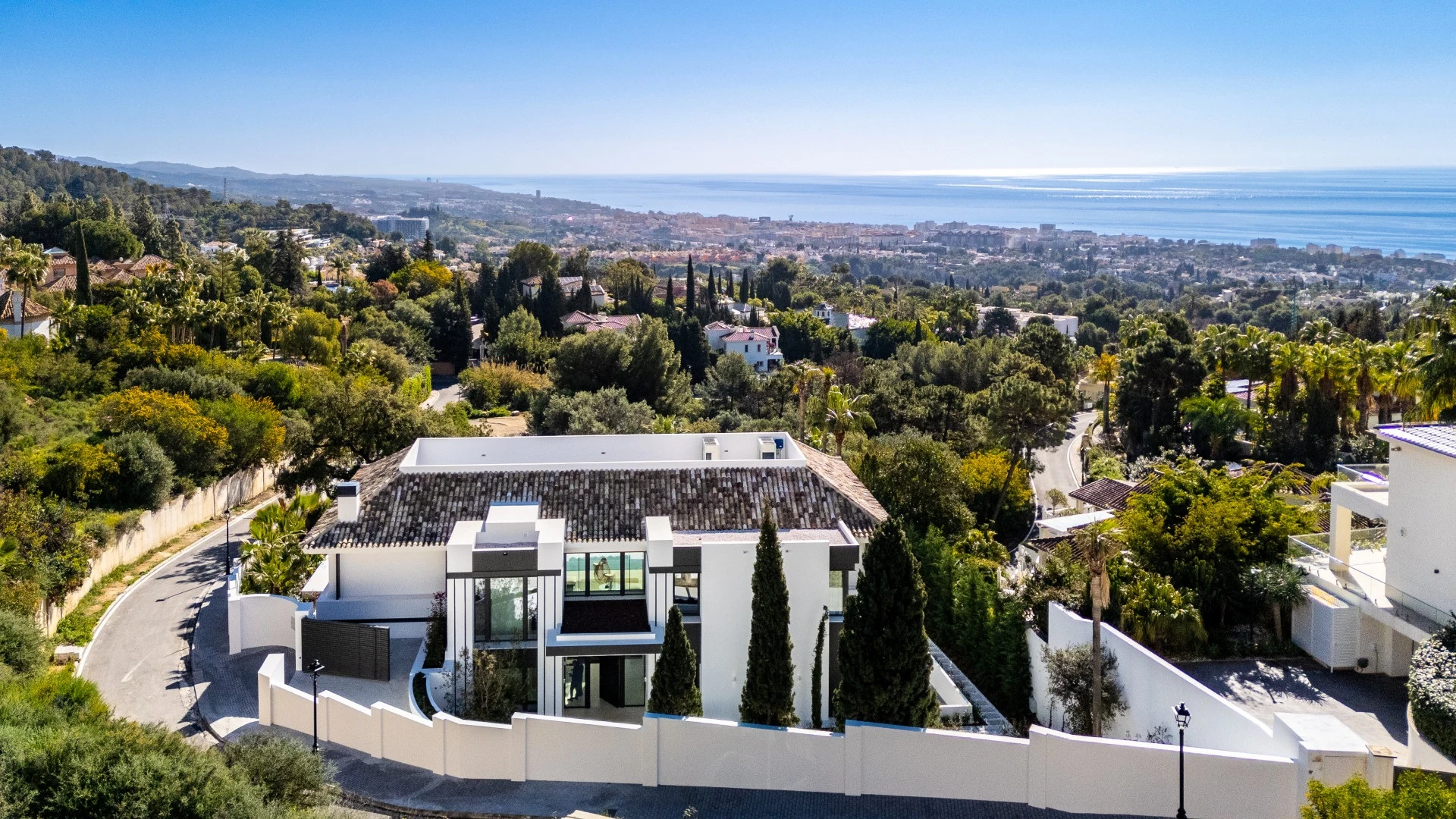 Aerial view of the villa and surrounding coastline