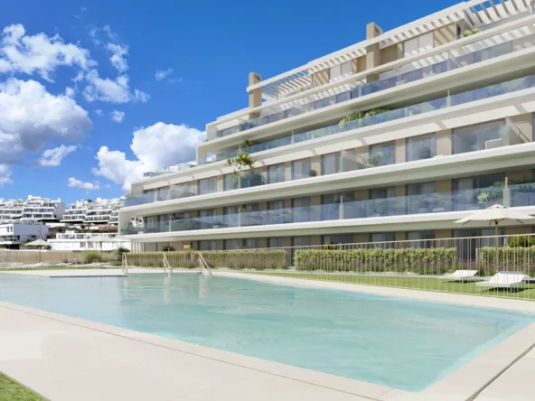 Communal swimming pool and apartments in Cancelada