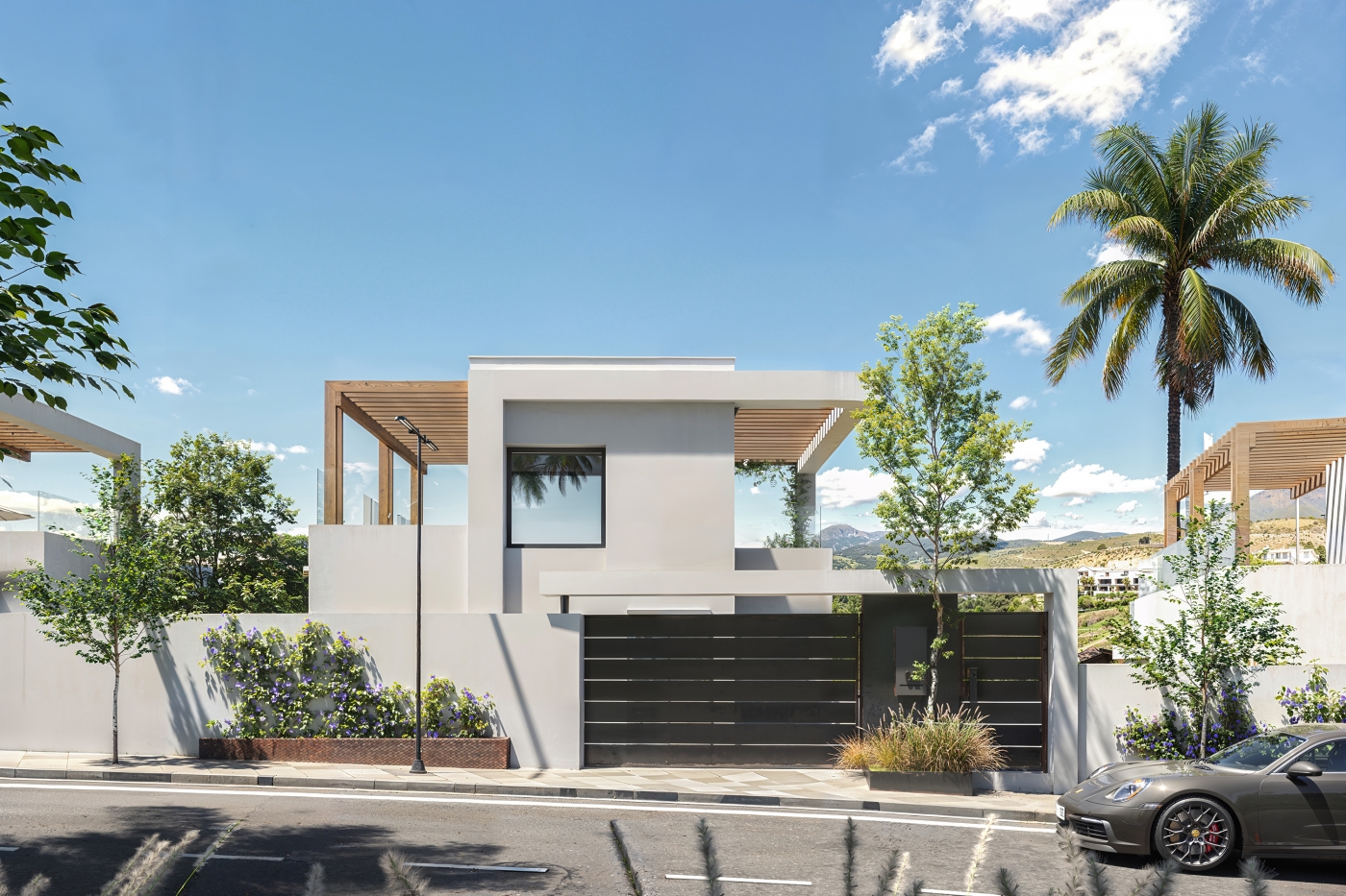 Illustrative villa entrance and private garage
