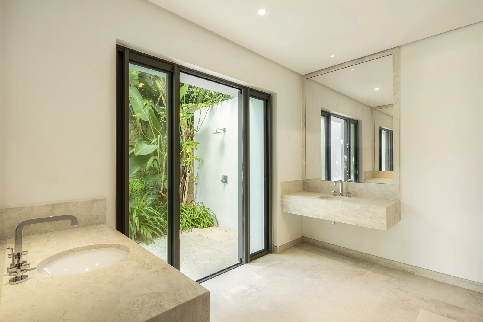 Bathroom with garden-facing windows