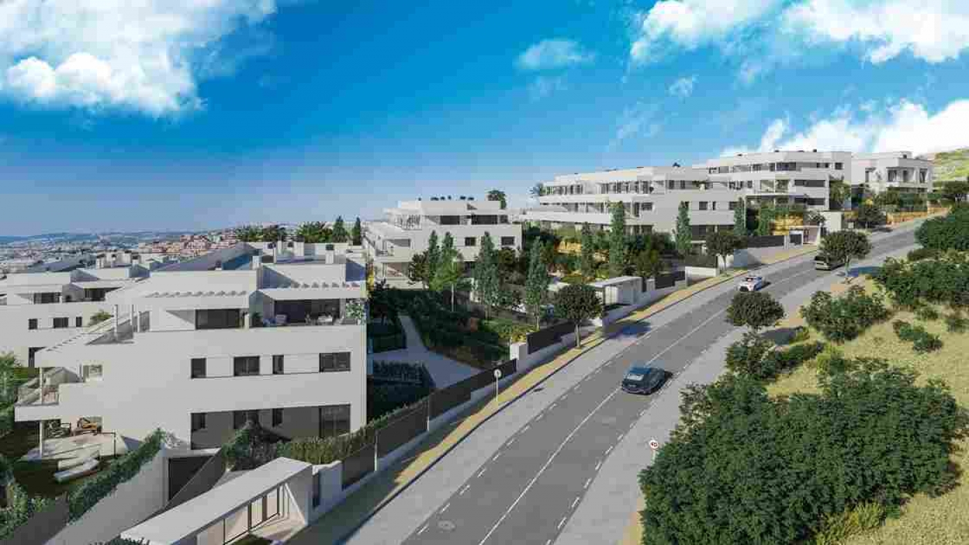 Illustrative residential buildings beside the access road