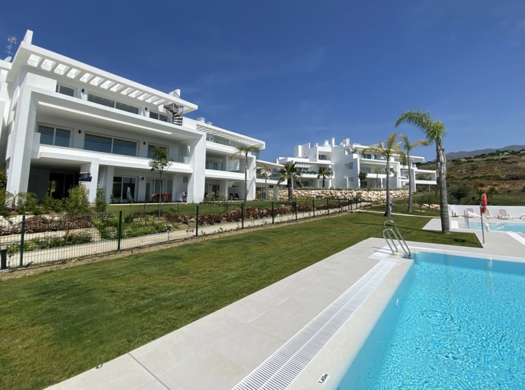Communal swimming pool beside the completed Casares residences