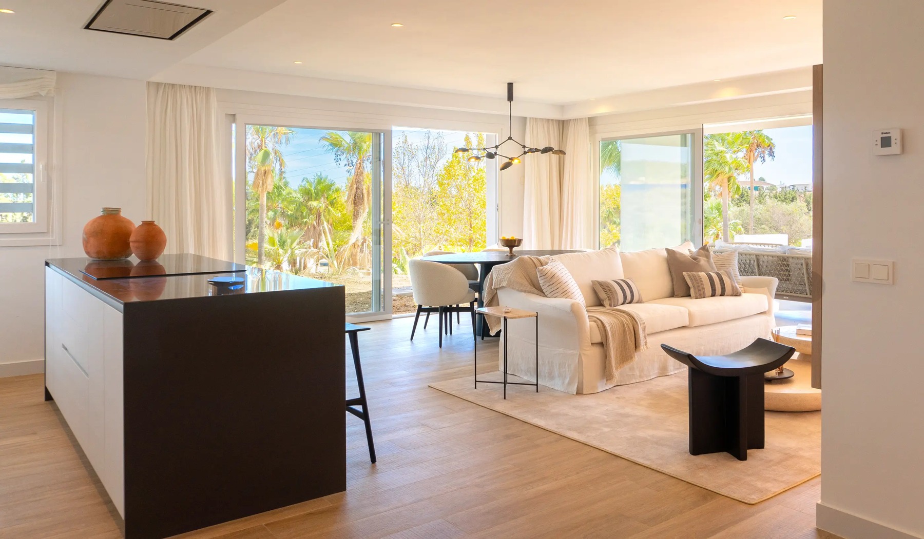 Open kitchen and living room in the presentation apartment