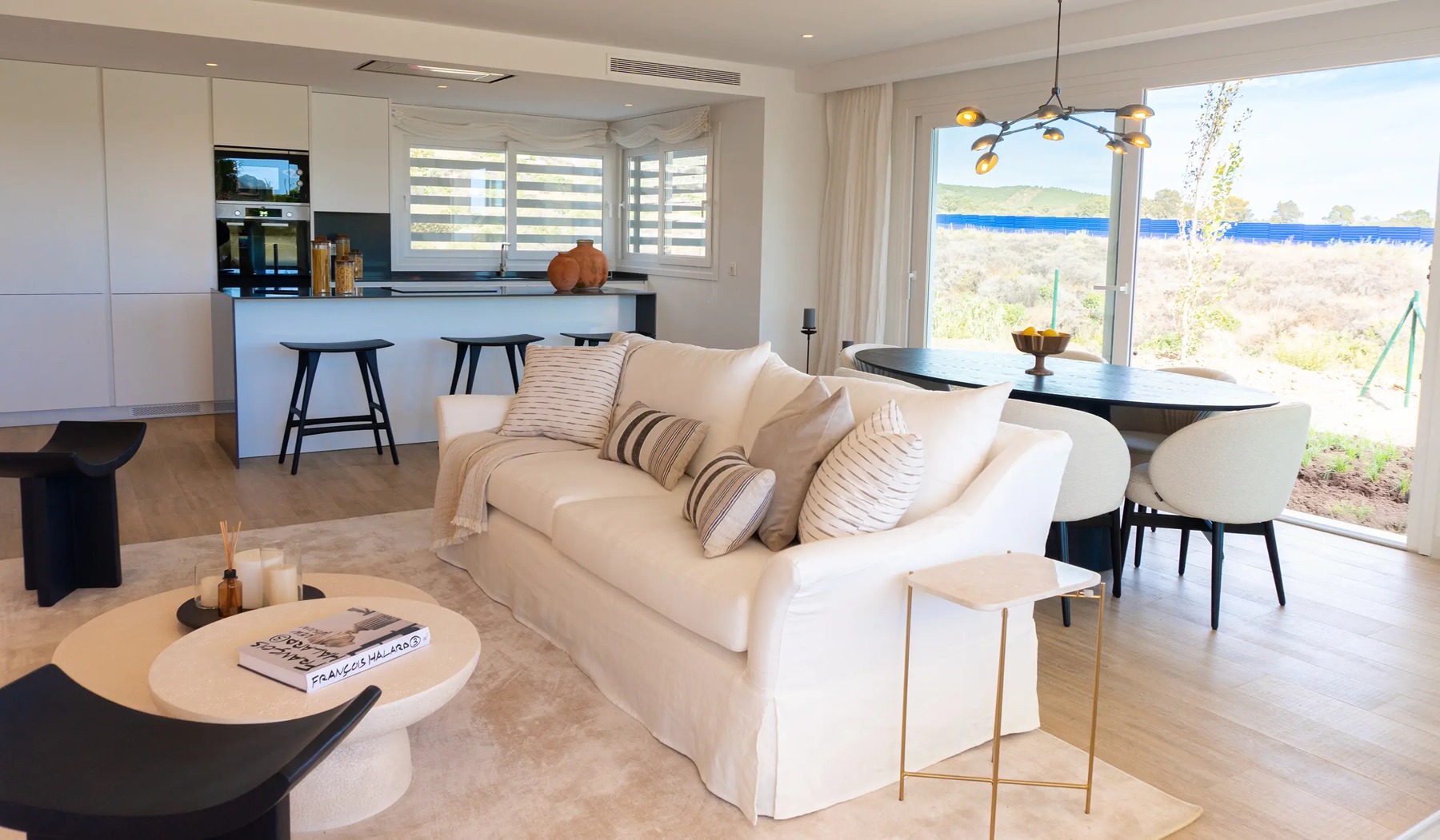 Furnished living area shown in the presentation apartment