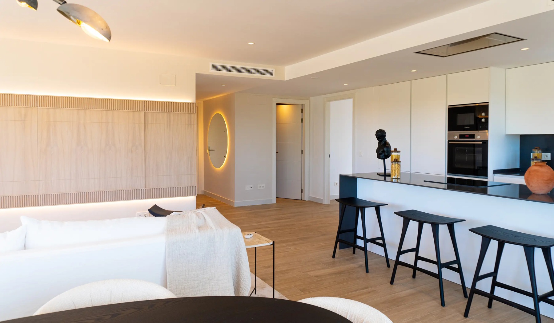 Bright furnished living space in the presentation apartment