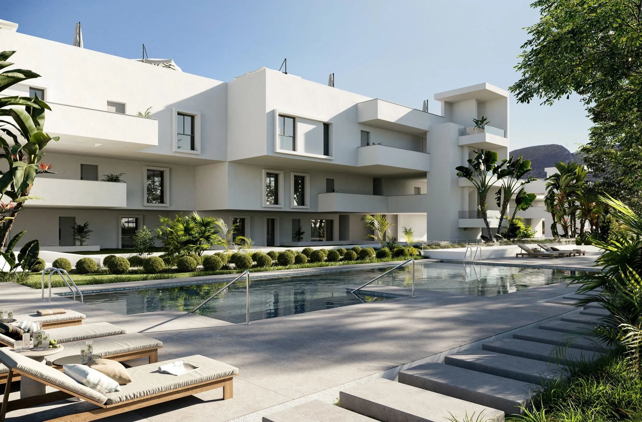Illustrative shared outdoor pool and landscaped gardens in Casares