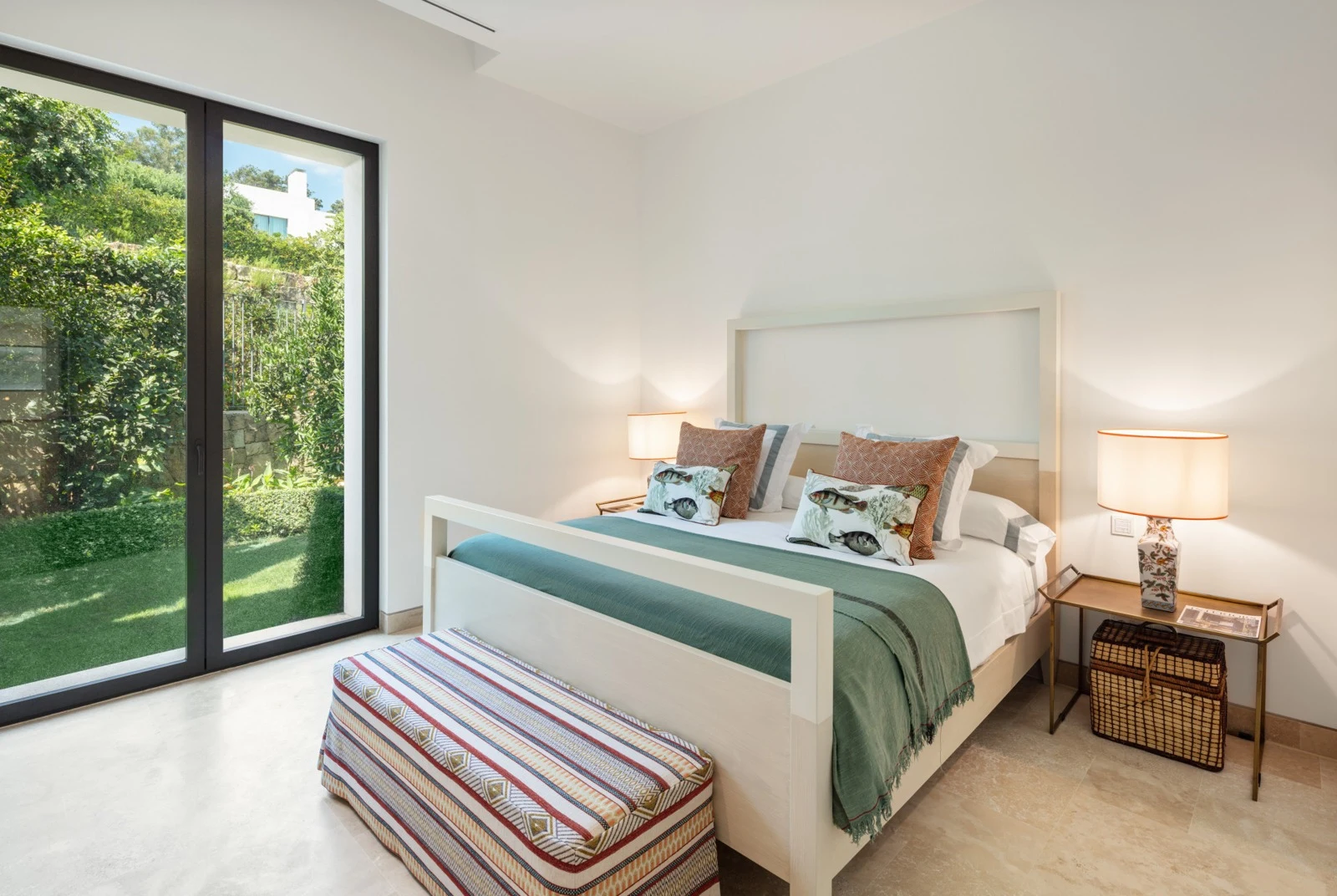 Guest bedroom opening onto the landscaped garden
