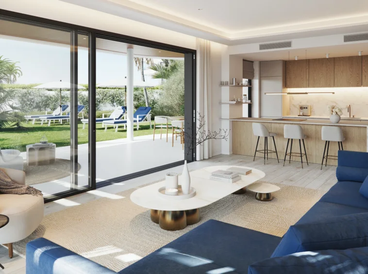 Illustrative living room opening onto a terrace and garden