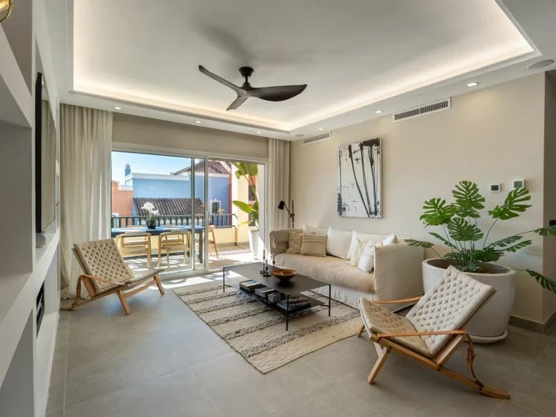 Living room opening onto a terrace in Nueva Andalucia