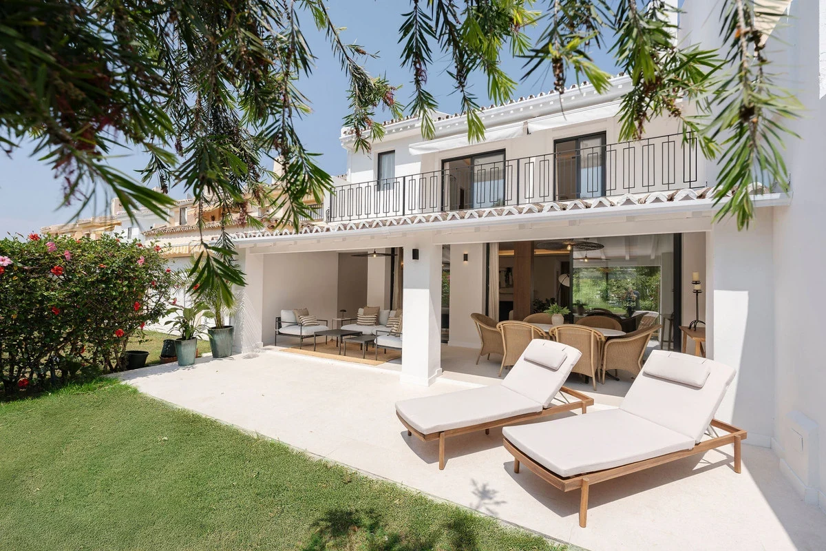 Townhouse facade and private garden in Nueva Andalucia