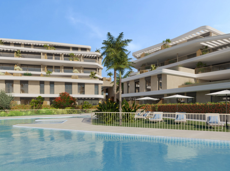 Communal pool surrounded by terraced apartment buildings