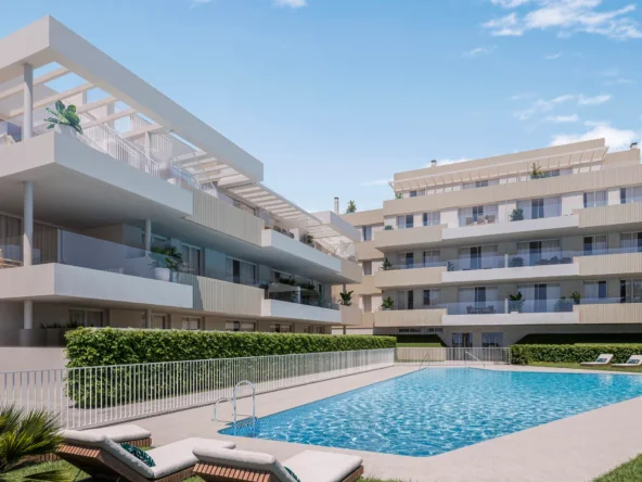 Communal swimming pool and apartments in Estepona
