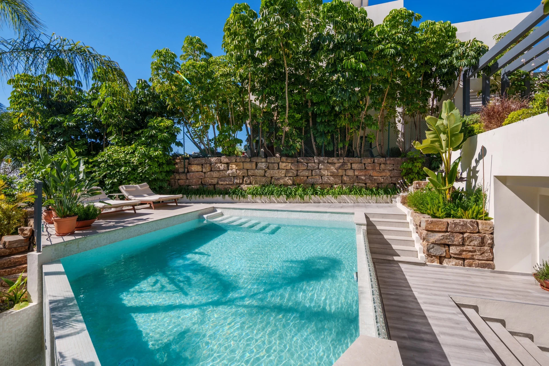 Private swimming pool and garden