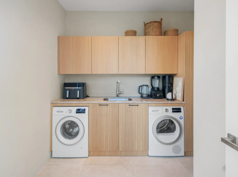 Utility room with laundry appliances