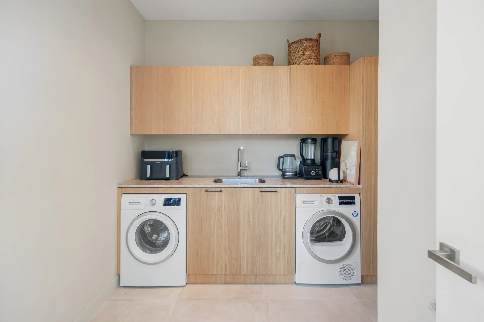 Utility room with laundry appliances