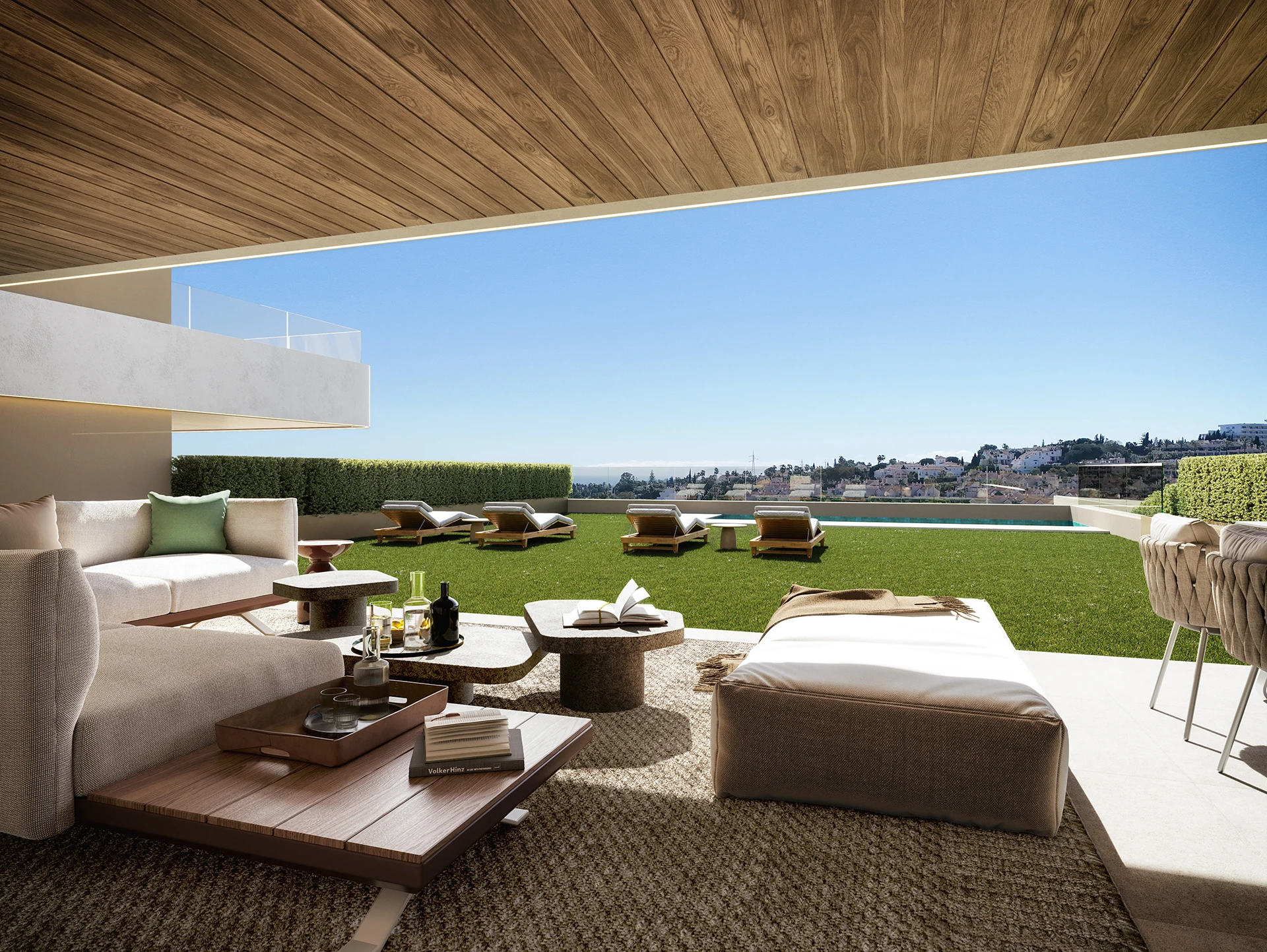 Illustrative garden lounge at new apartments in El Campanario
