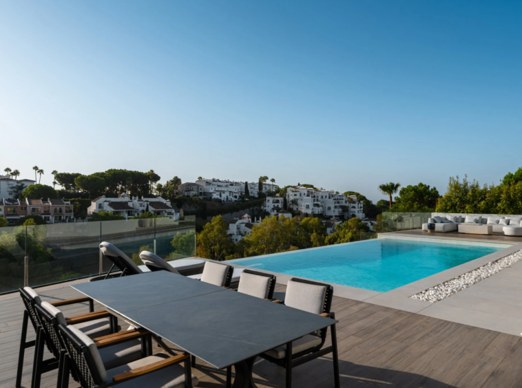 Outdoor dining terrace beside the infinity pool