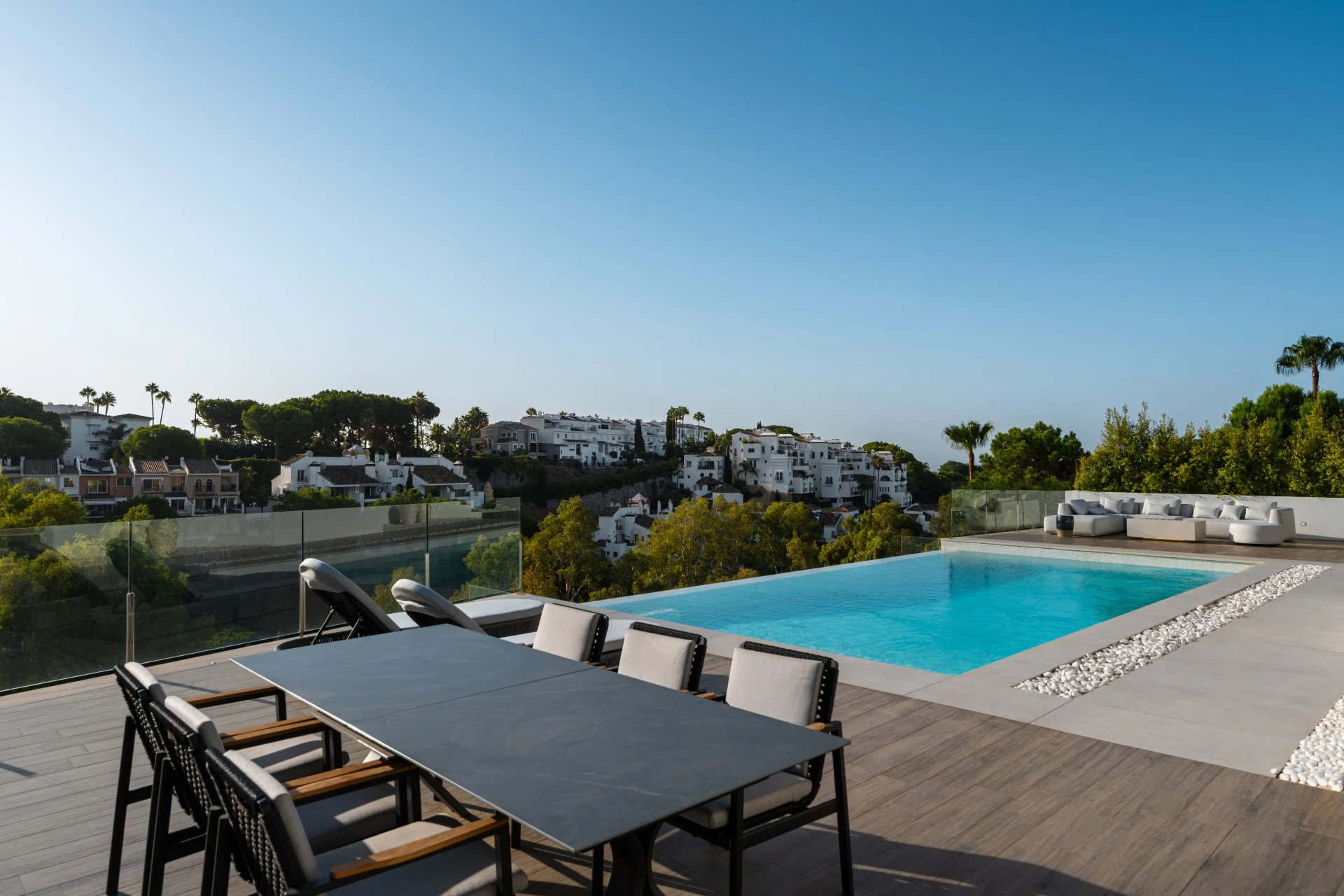 Outdoor dining terrace beside the infinity pool