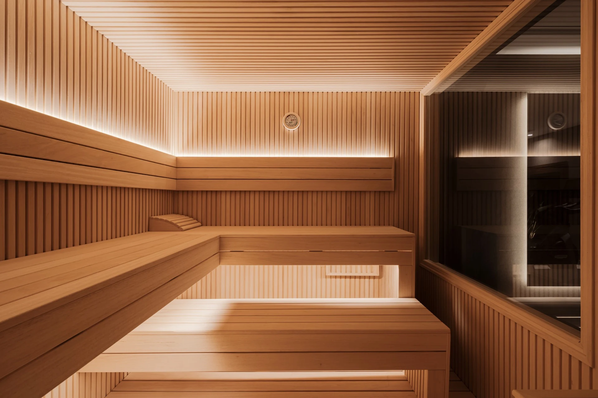 Private sauna with timber benches
