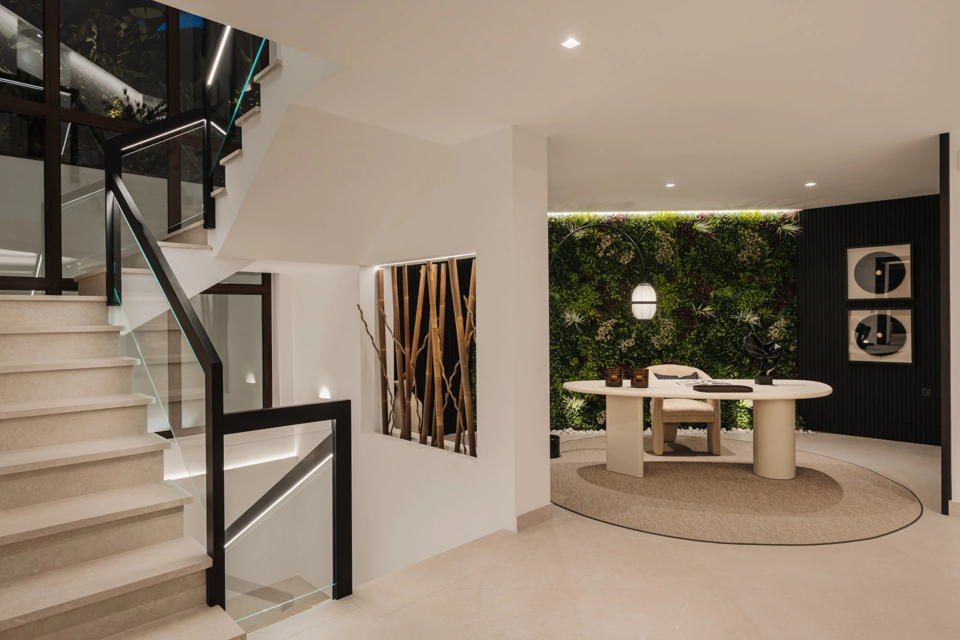 Entrance hall with staircase and garden outlook
