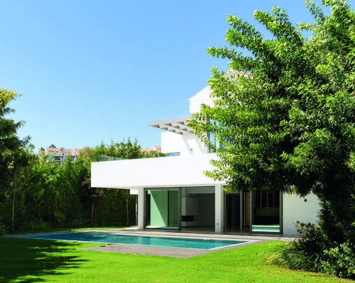Private garden and pool beside an El Paraiso villa