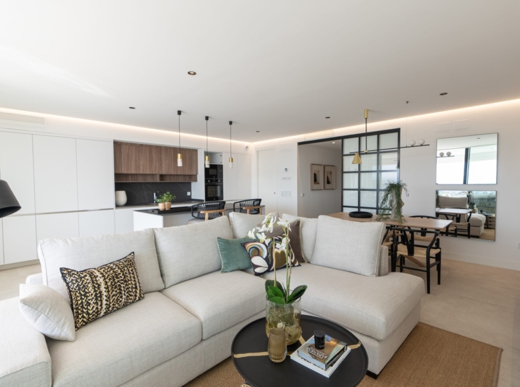 Representative show-home living room and open kitchen