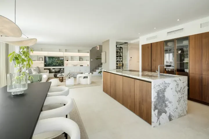 Fitted kitchen with marble island
