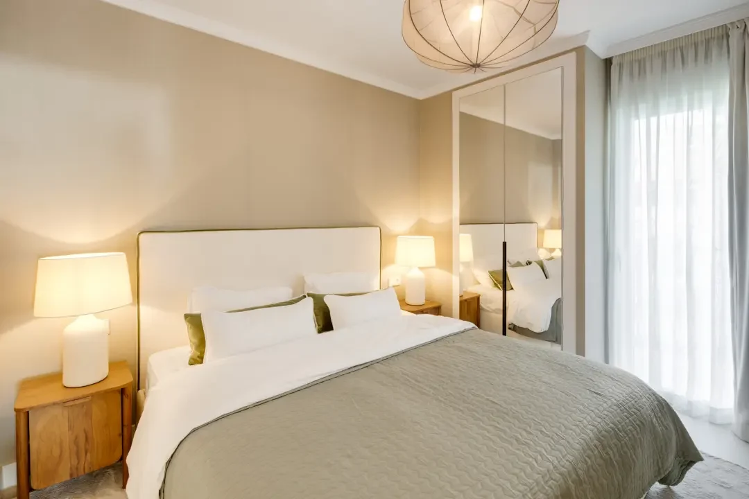 Double bedroom with soft neutral finishes