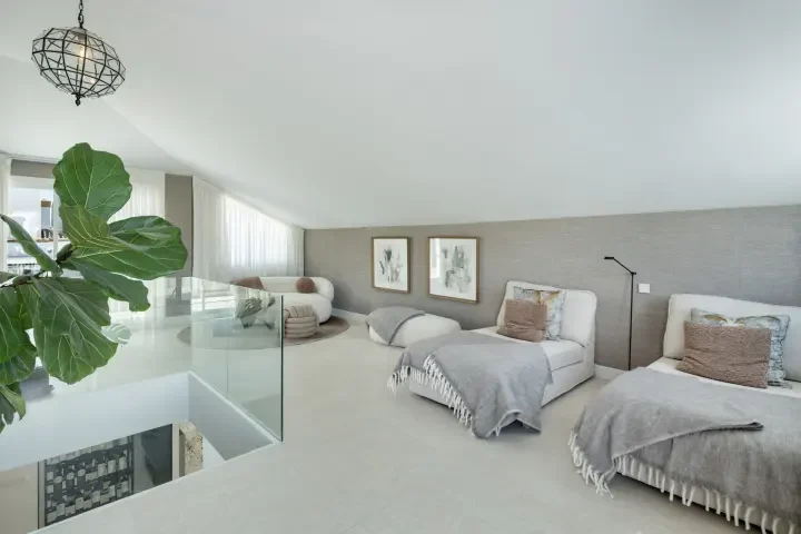 Upper-level lounge with terrace access