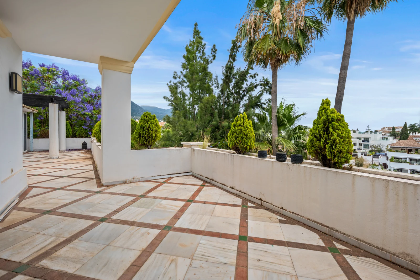 Private terrace with palm trees on the Golden Mile