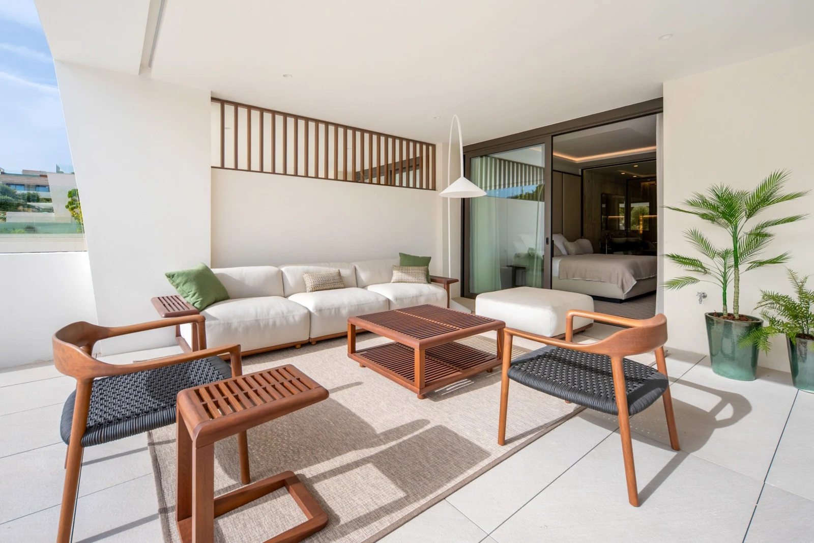Private terrace seating beside the apartment