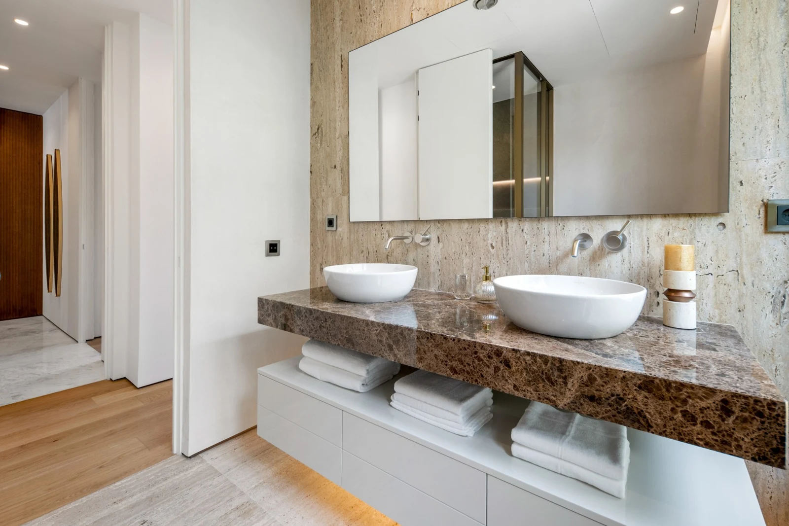 Guest bathroom with stone vanity and walk-in shower